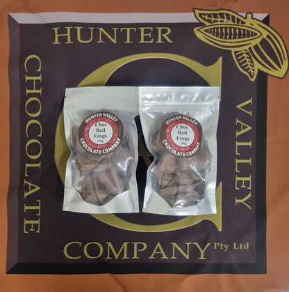 Milk chocolate coated red frogs