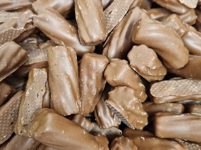 Milk chocolate coated licorice