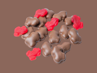 Milk chocolate coated red frogs