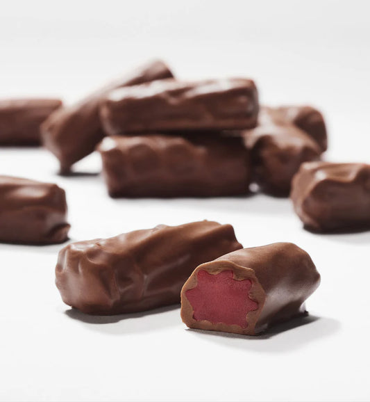Milk choc coated strawberry licorice